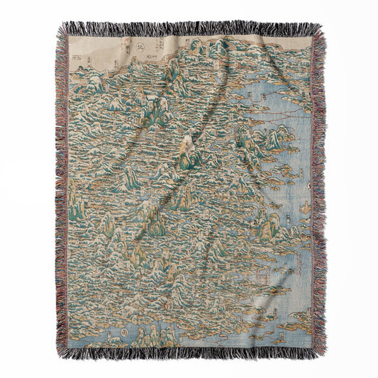 Japanese Woodblock woven throw blanket, made from 100% cotton, offering a soft and cozy texture with a vintage map of China design for home decor.