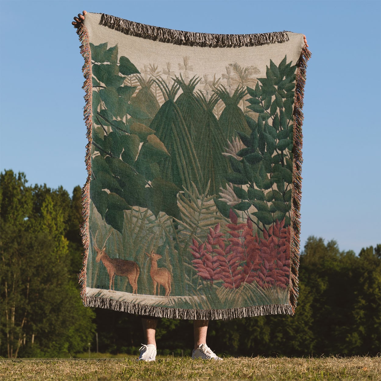 Jungle Woven Throw Blanket Held Up Outside