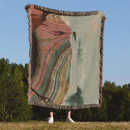 Layers of the Earth Woven Throw Blanket Held Up Outside