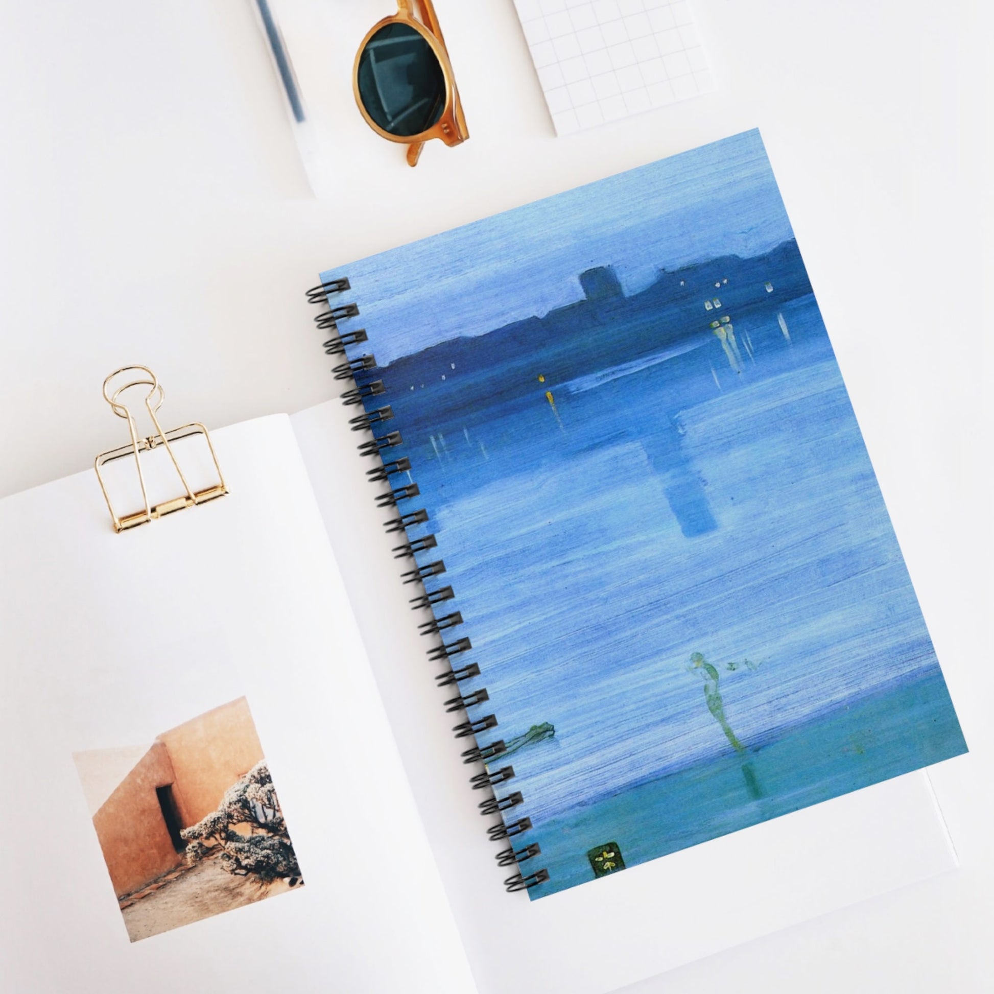 Light Blue Abstract Spiral Notebook Displayed on Desk