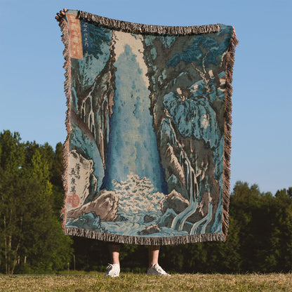 Light Blue Nature Woven Blanket Held on a Woman's Back Outside