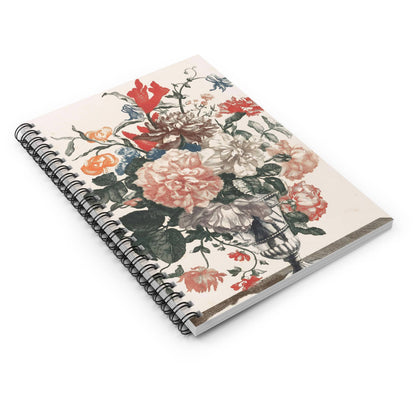 Light Floral Spiral Notebook Laying Flat on White Surface