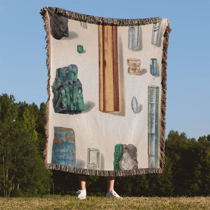 Raw Colorful Gemstones Woven Throw Blanket Held Up Outside