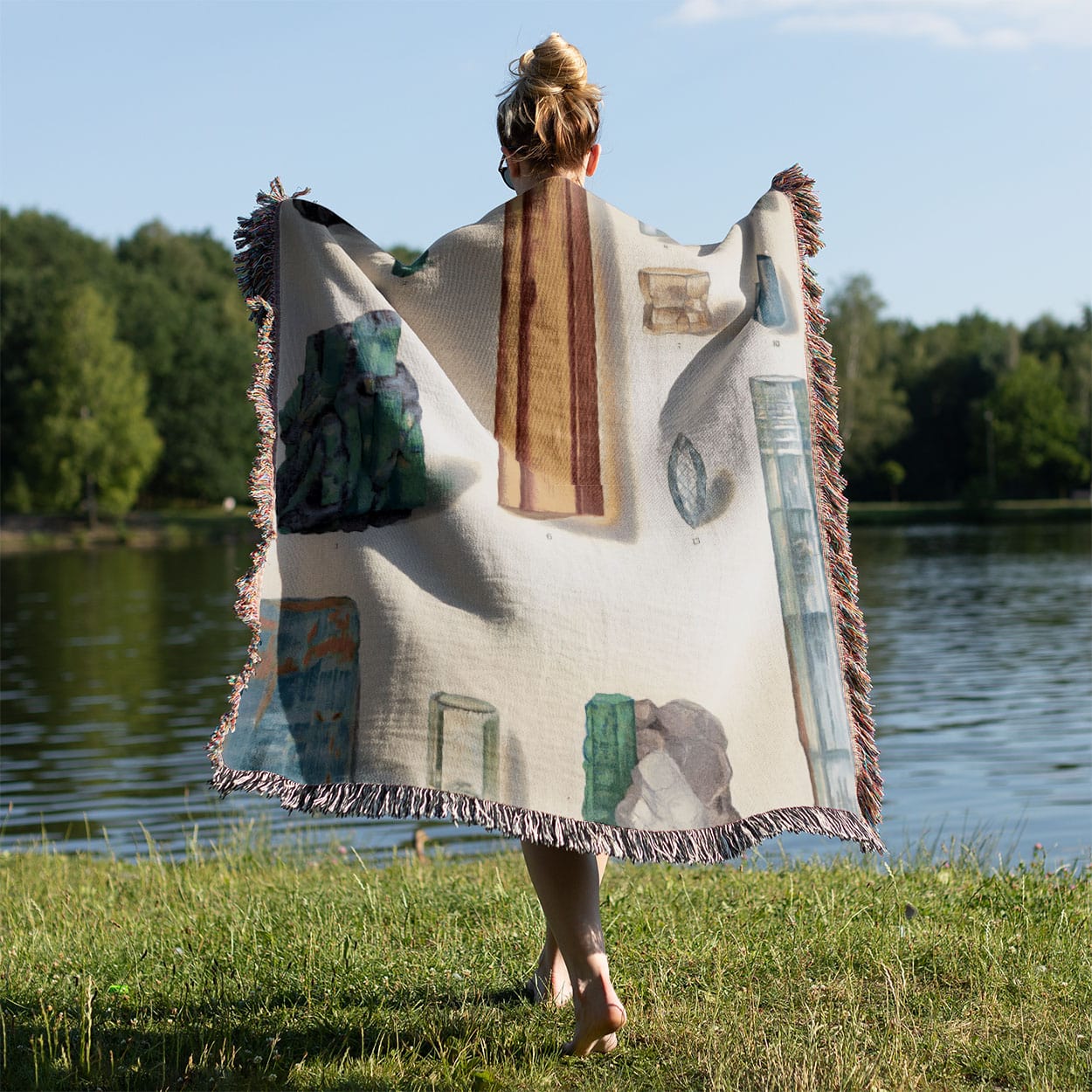 Light Green and Blue Crystal Gemstones Woven Blanket Held on a Woman's Back Outside