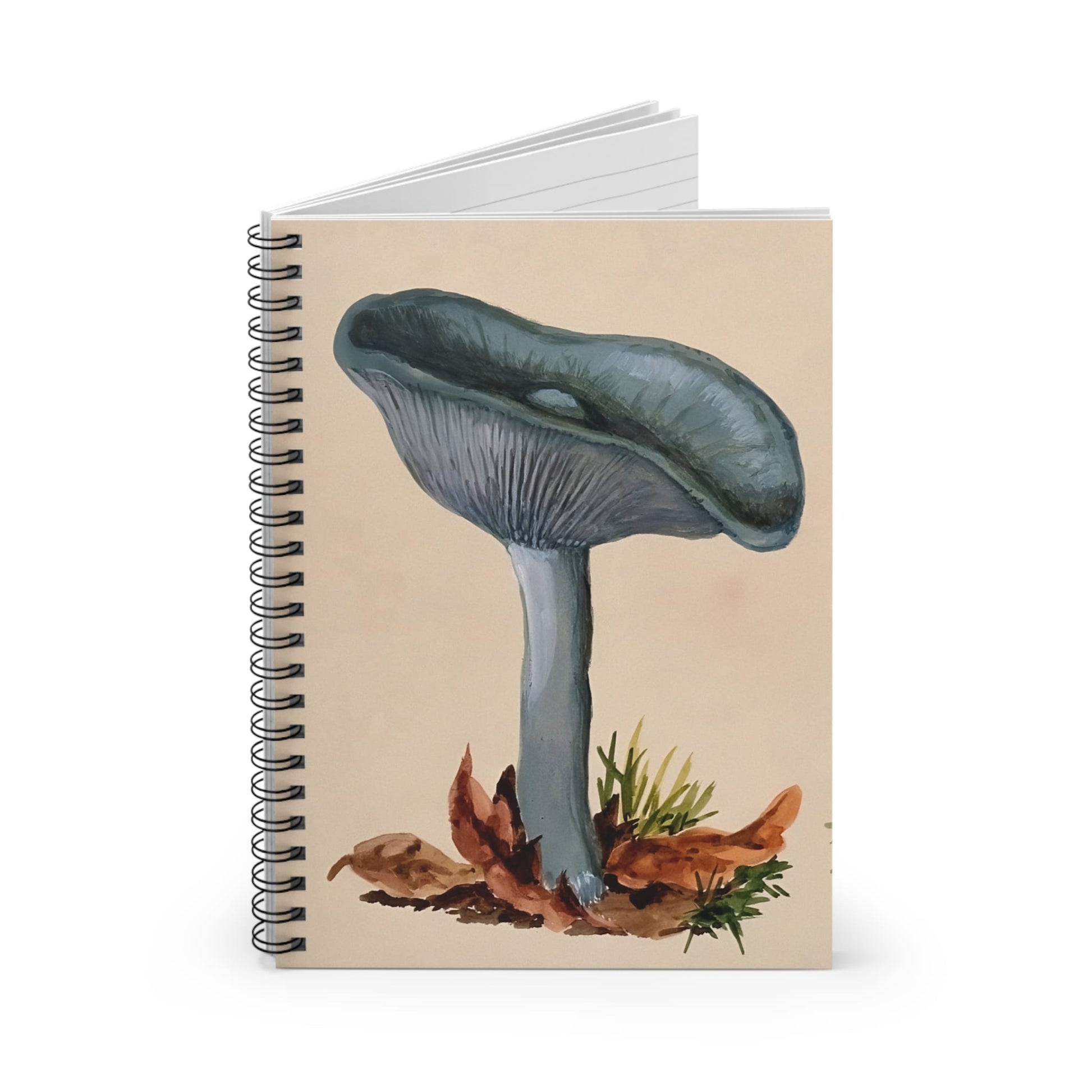 Little Blue Mushrooms Spiral Notebook Standing up on White Desk