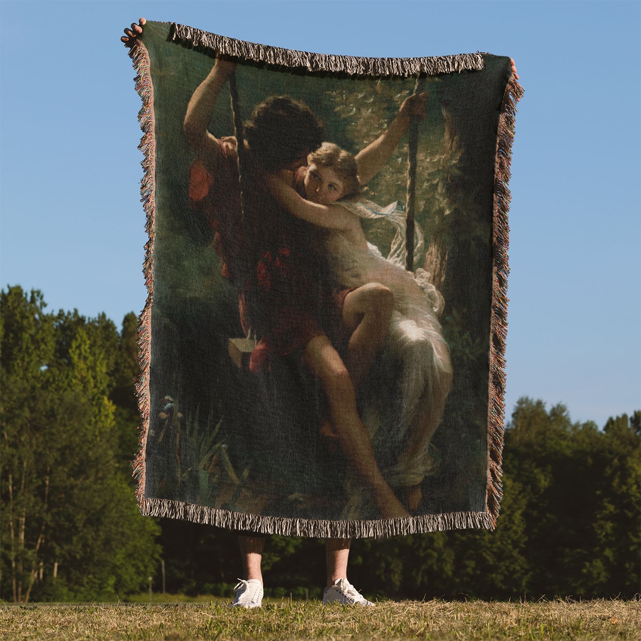 Lovers on a Swing Woven Blanket Held on a Woman's Back Outside