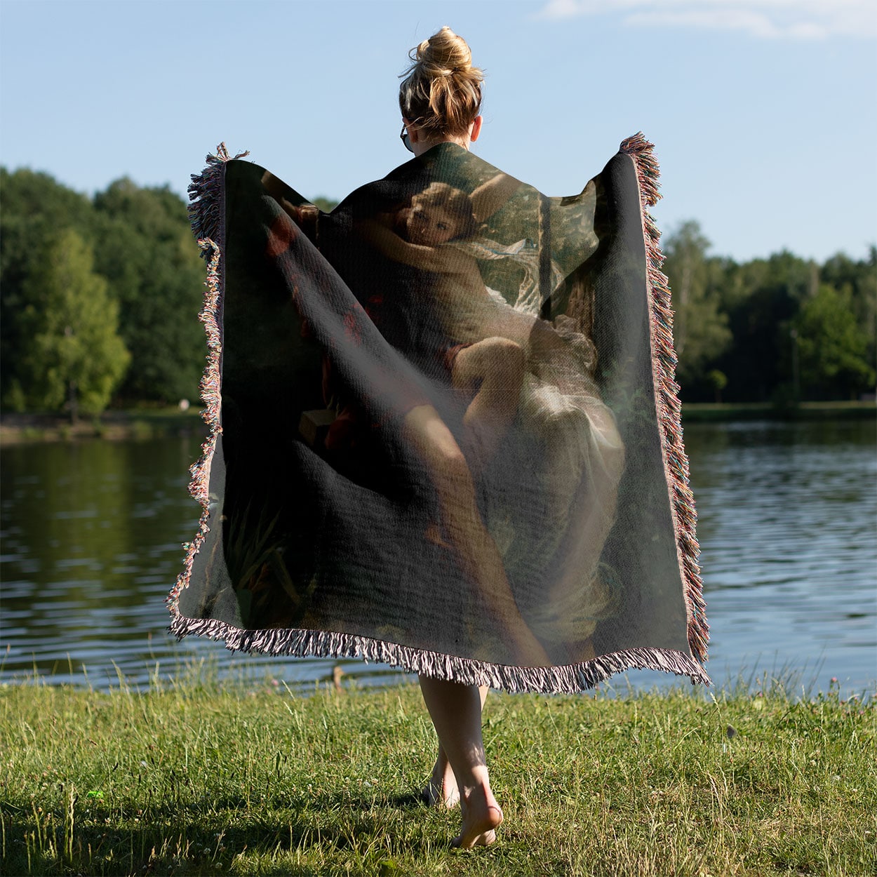 Lovers on a Swing Woven Blanket Held Up Outside