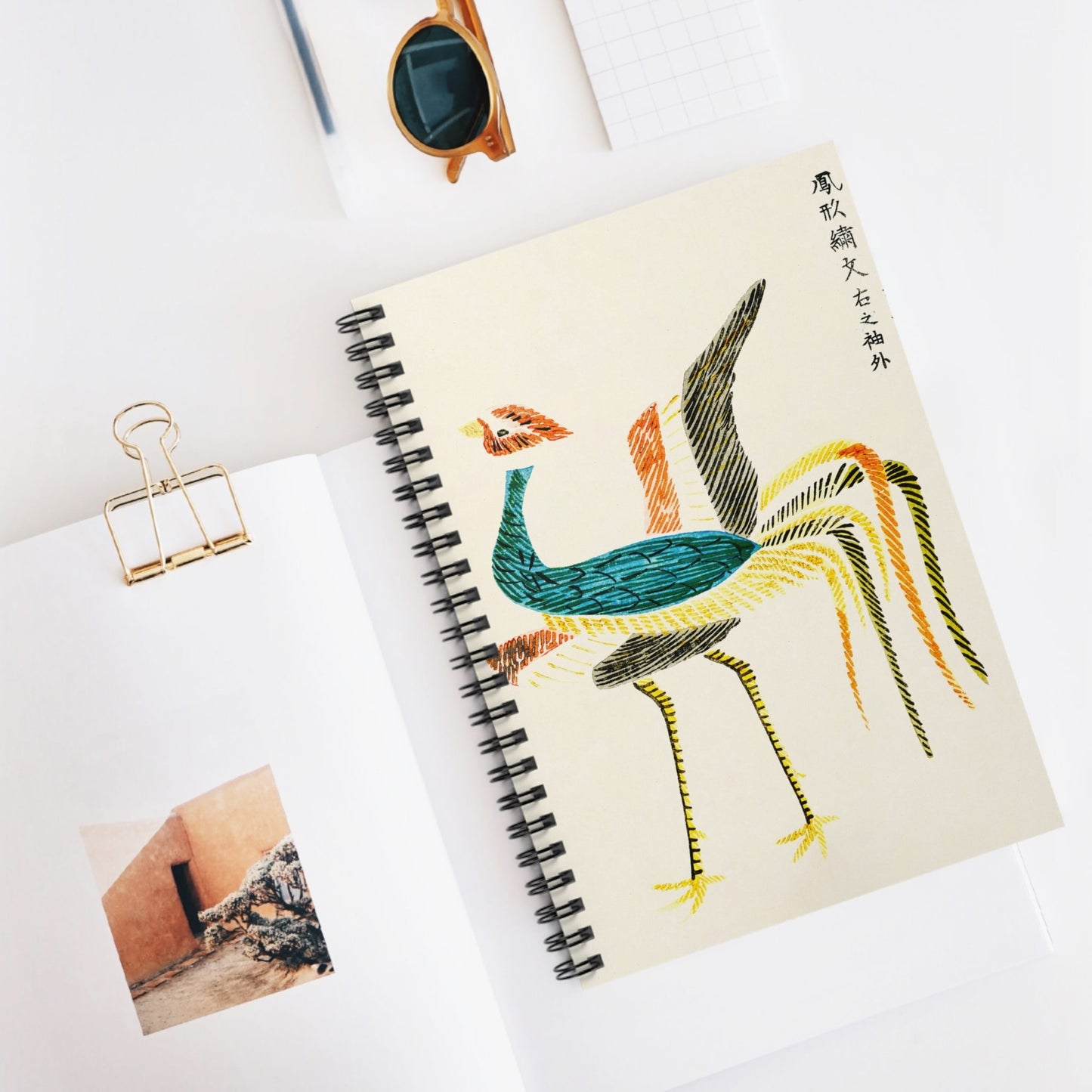 Minimalist Bird Spiral Notebook Displayed on Desk