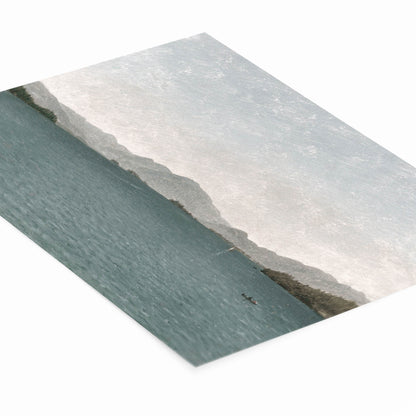 Blue and Gray Painting Laying Flat on a White Background