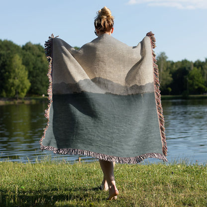 Minimalist Mountains Woven Blanket Held Up Outside