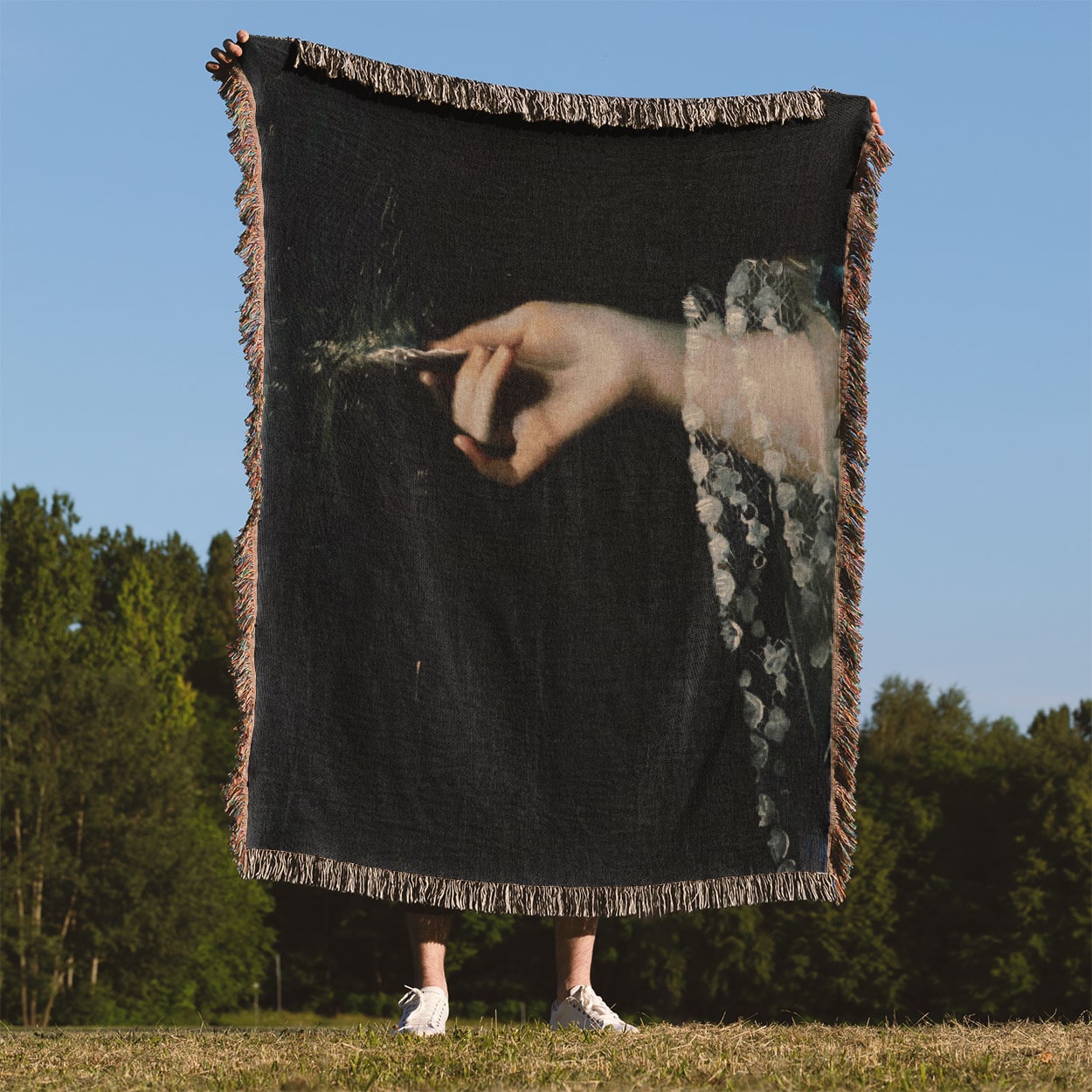 Moody Dark Academia Woven Throw Blanket Held Up Outside