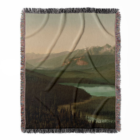 Mountains woven throw blanket, made of 100% cotton, featuring a soft and cozy texture with an Emerald Lake theme for home decor.