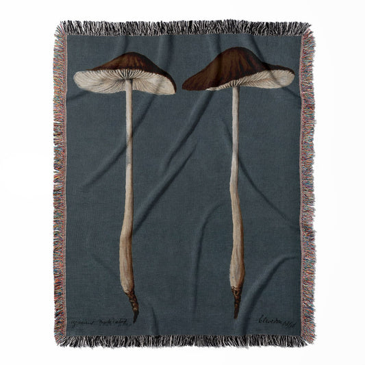 Mushroom woven throw blanket, made with 100% cotton, featuring a soft and cozy texture with a cool mushrooms design for home decor.