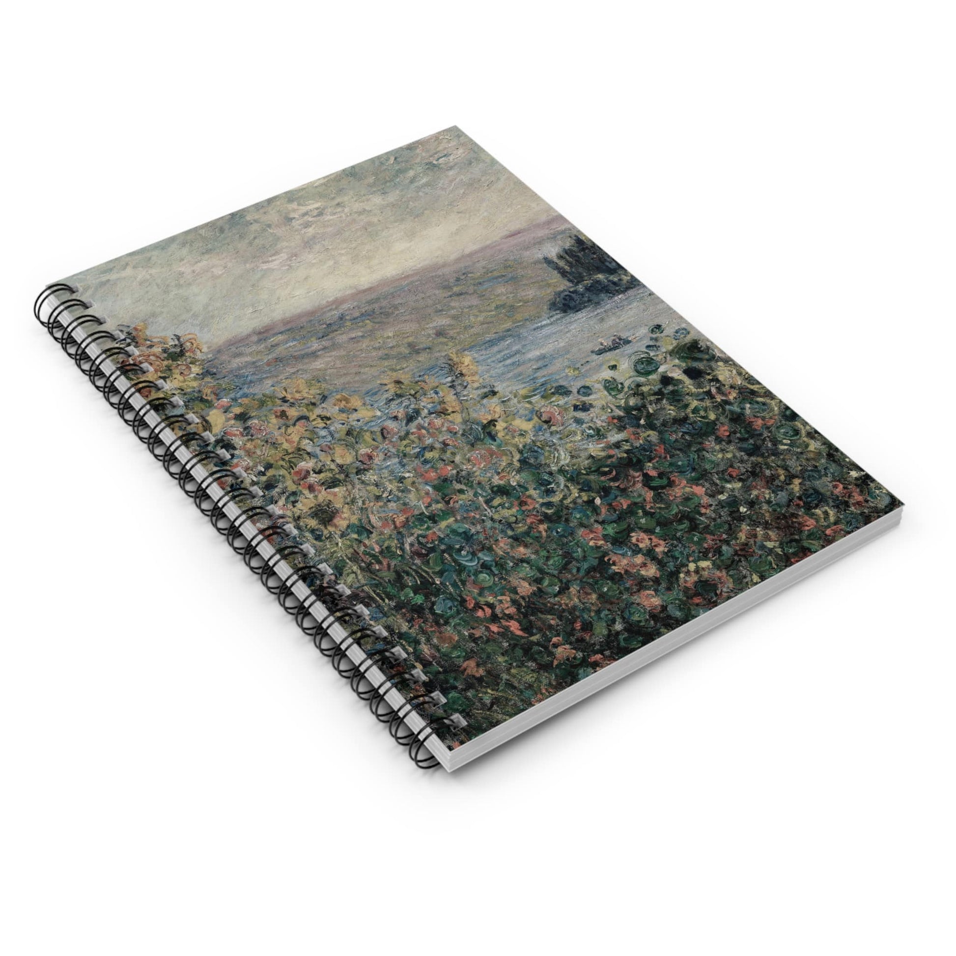 Muted Floral Spiral Notebook Laying Flat on White Surface