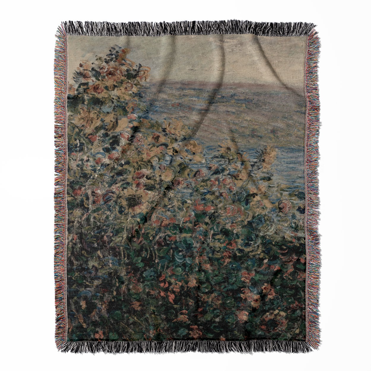 Muted Floral woven throw blanket, made with 100% cotton, providing a soft and cozy texture with a Claude Monet design for home decor.