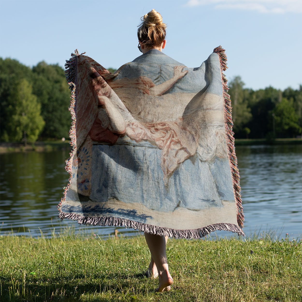 Napping Woven Throw Blanket Held on a Woman's Back Outside