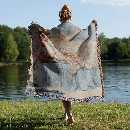 Napping Woven Throw Blanket Held on a Woman's Back Outside