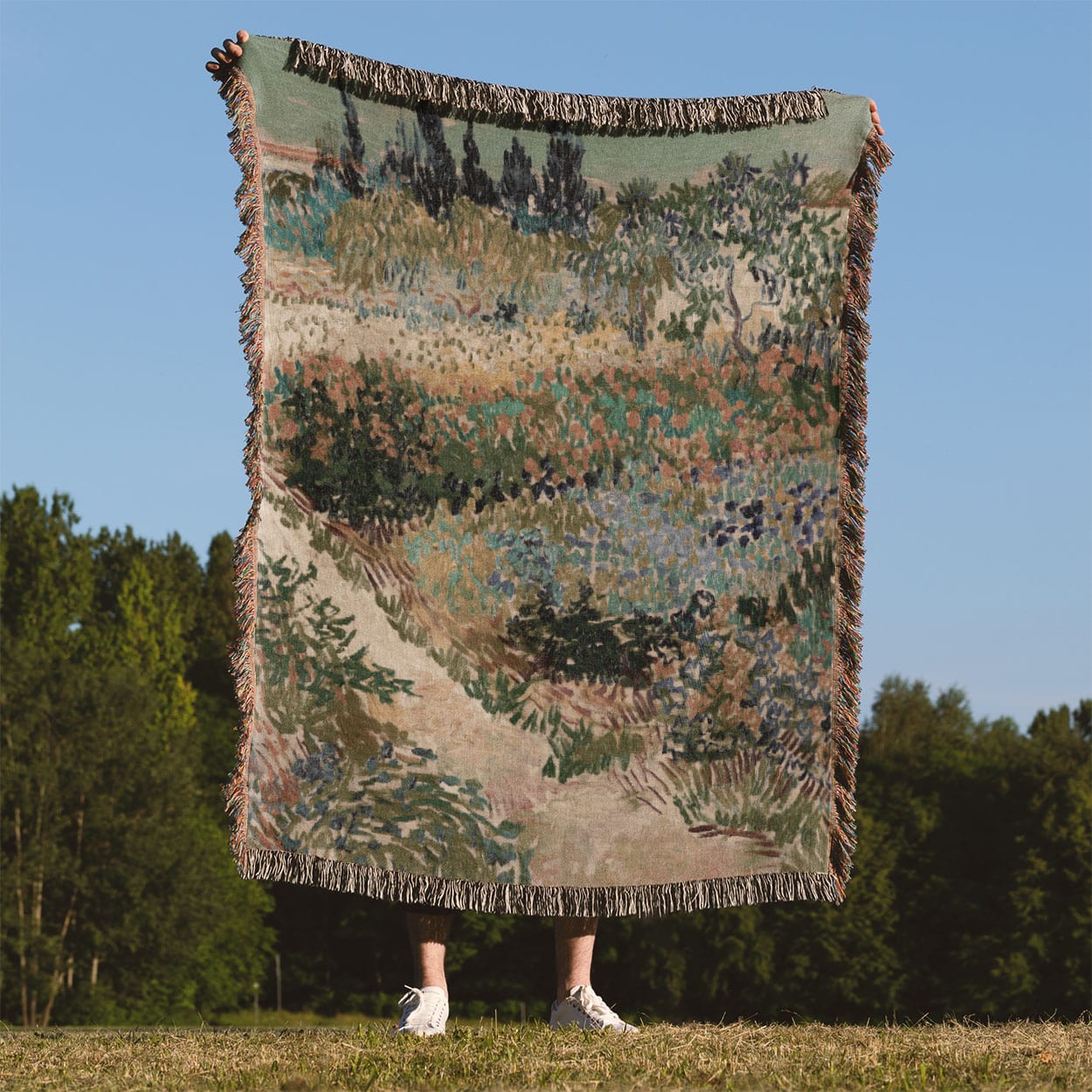 Nature Landscape Woven Blanket Held on a Woman's Back Outside