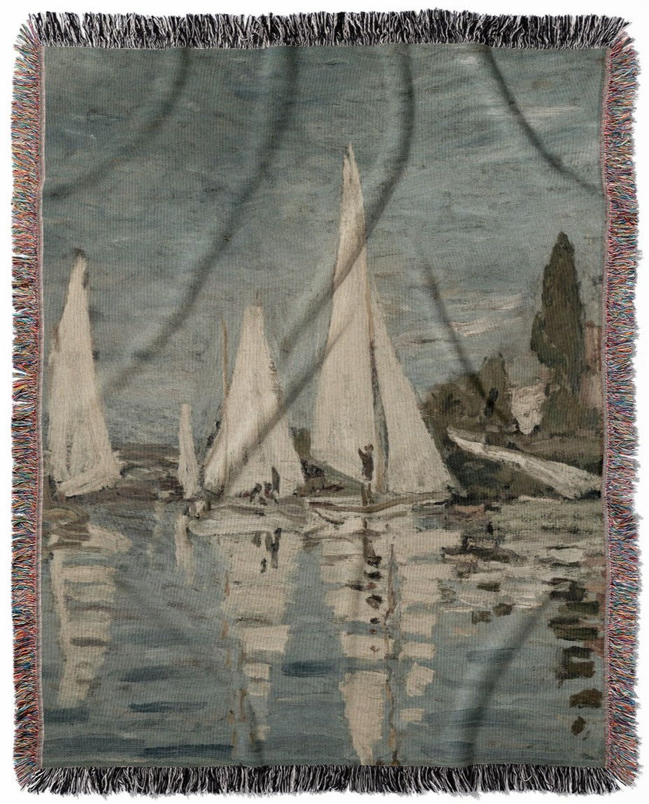 Nautical woven throw blanket, made with 100% cotton, providing a soft and cozy texture with sailboats for home decor.