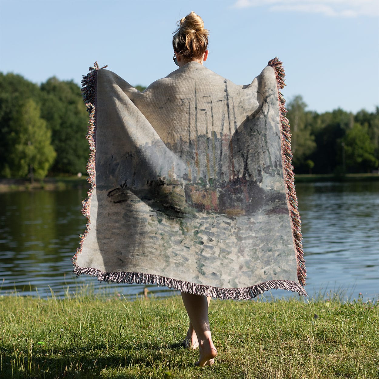 Nautical Woven Blanket Held Up Outside