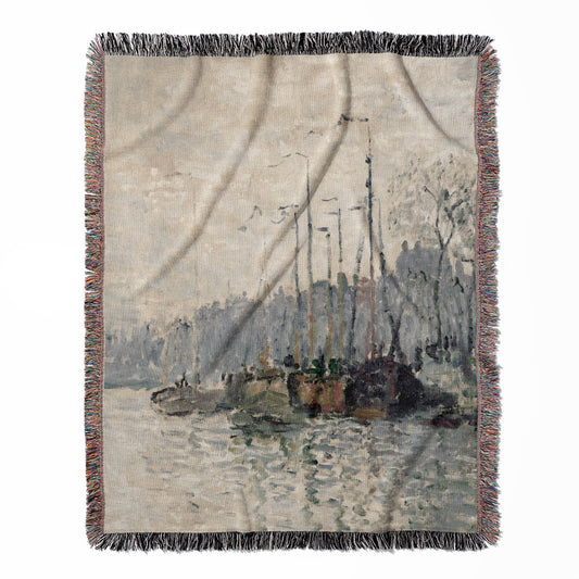 Nautical woven throw blanket, made with 100% cotton, presenting a soft and cozy texture with a seascape and city theme for home decor.
