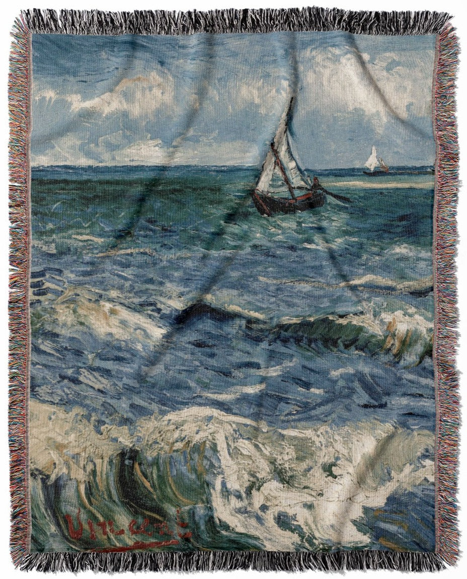 Ocean woven throw blanket, made with 100% cotton, offering a soft and cozy texture with a sailboat theme for home decor.