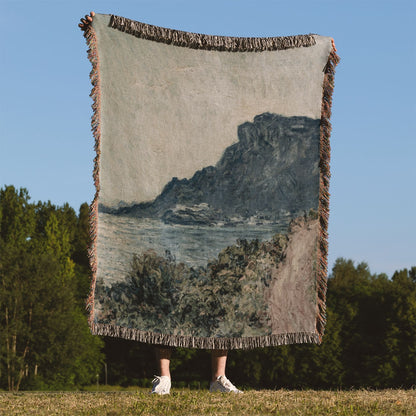 Ocean Scenery Woven Blanket Held on a Woman's Back Outside