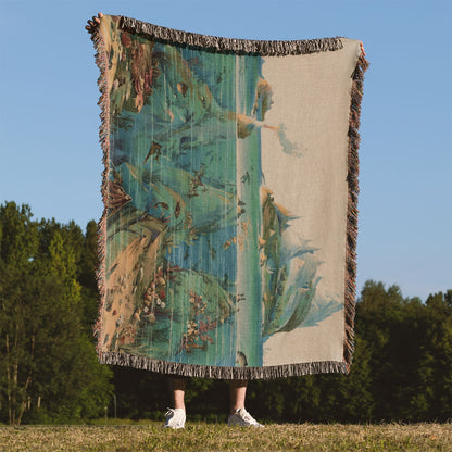 Ocean Woven Blanket Held on a Woman's Back Outside