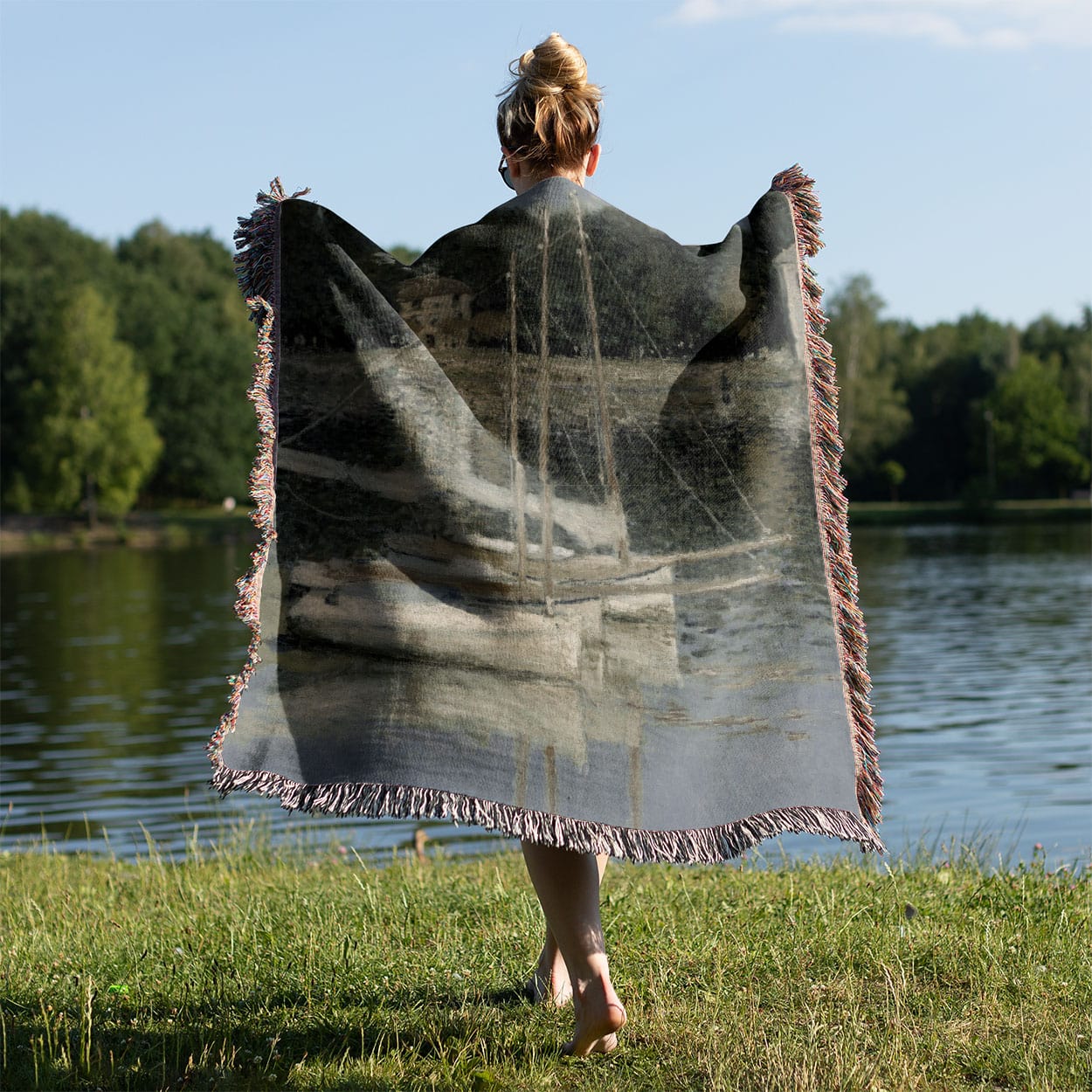Peaceful River Woven Blanket Held Up Outside