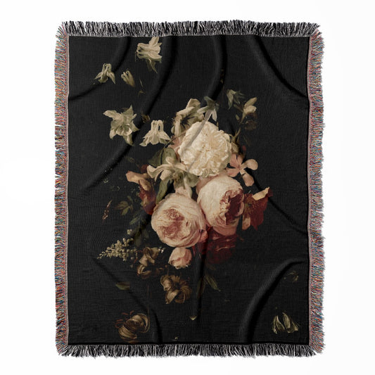 Peony woven throw blanket, made with 100% cotton, providing a soft and cozy texture in a still life art style for home decor.