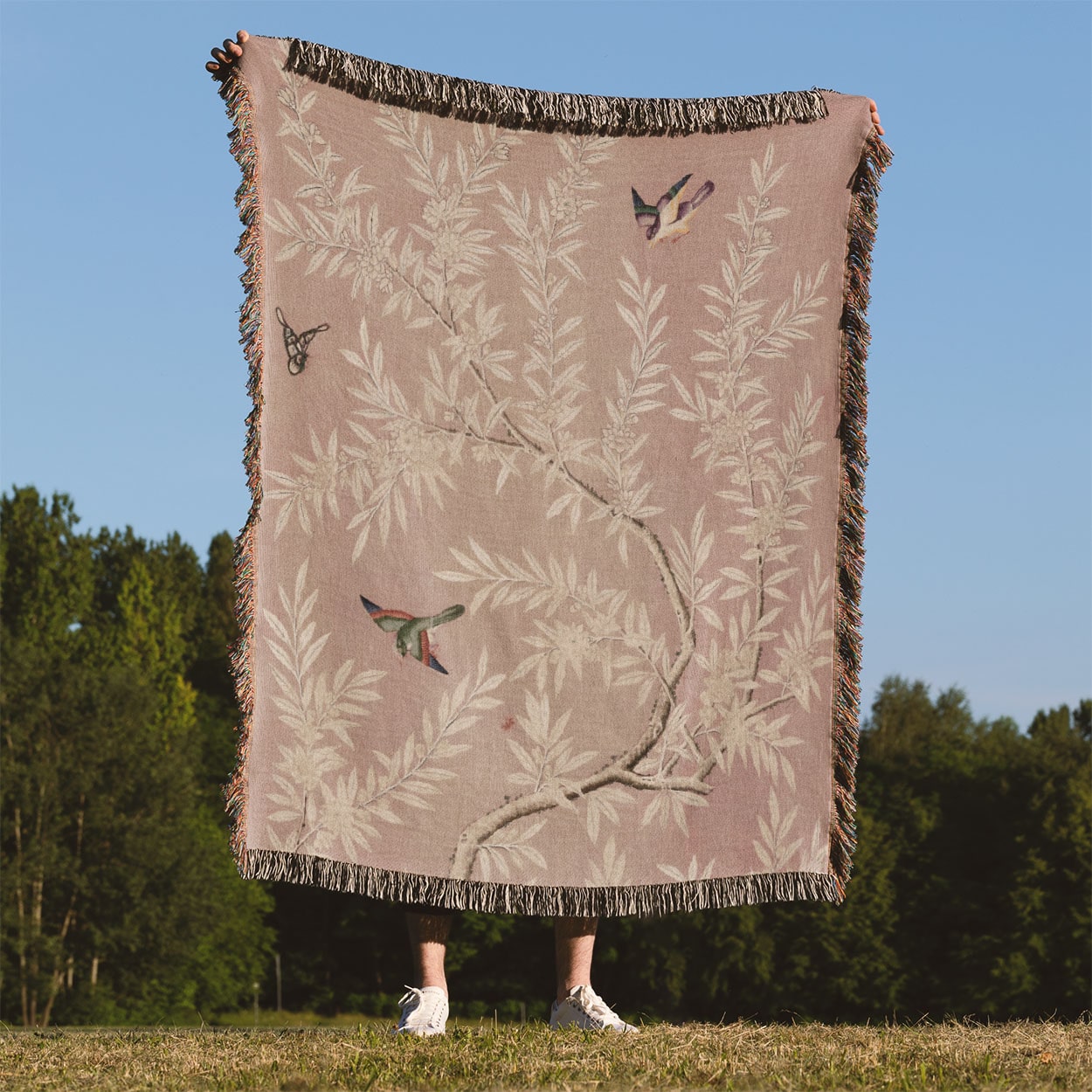 Pink Floral Woven Throw Blanket Held Up Outside