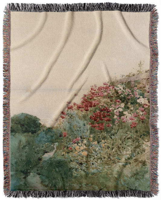Poppy woven throw blanket, crafted from 100% cotton, offering a soft and cozy texture with a landscape painting design for home decor.
