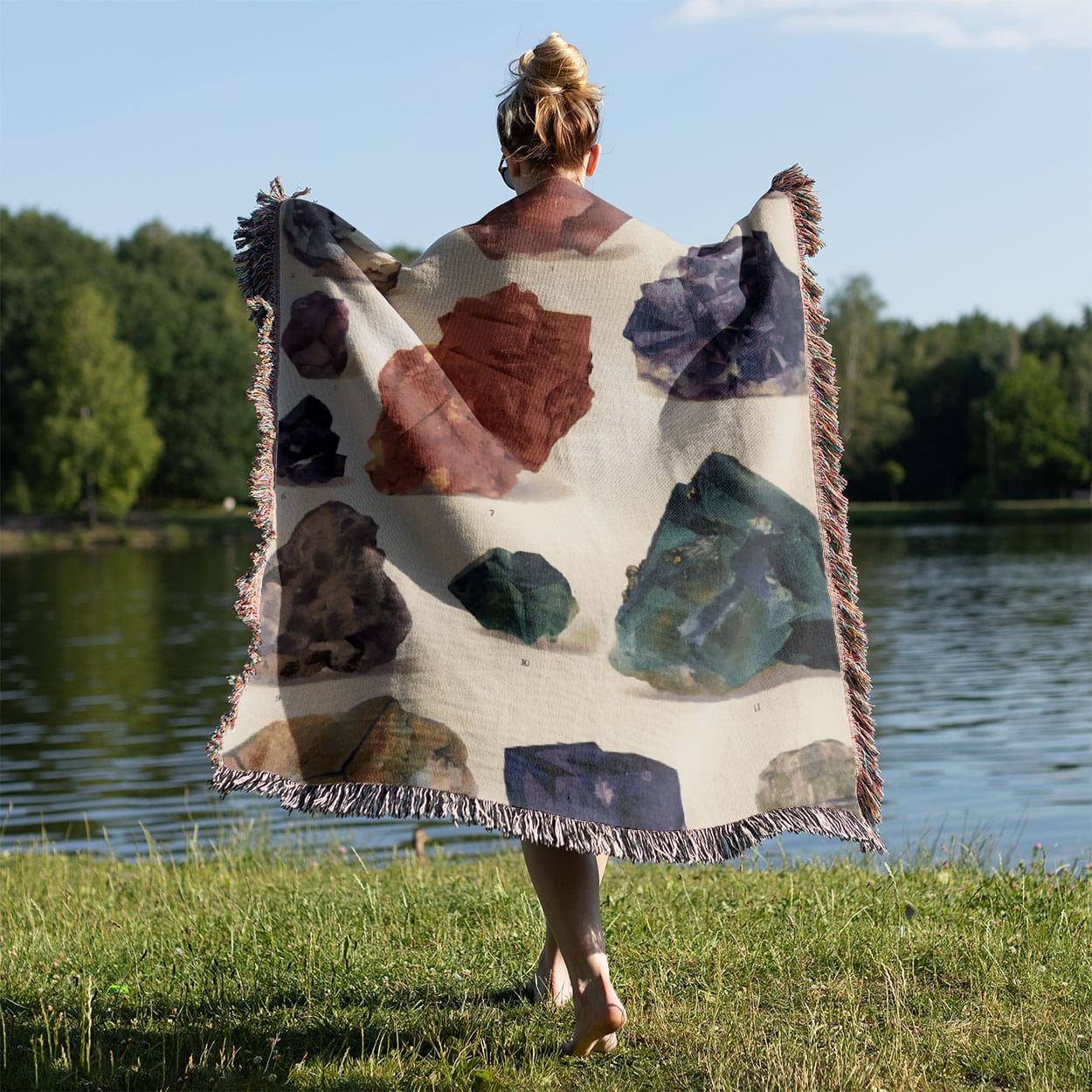 Raw Colorful Gemstones Woven Blanket Held on a Woman's Back Outside