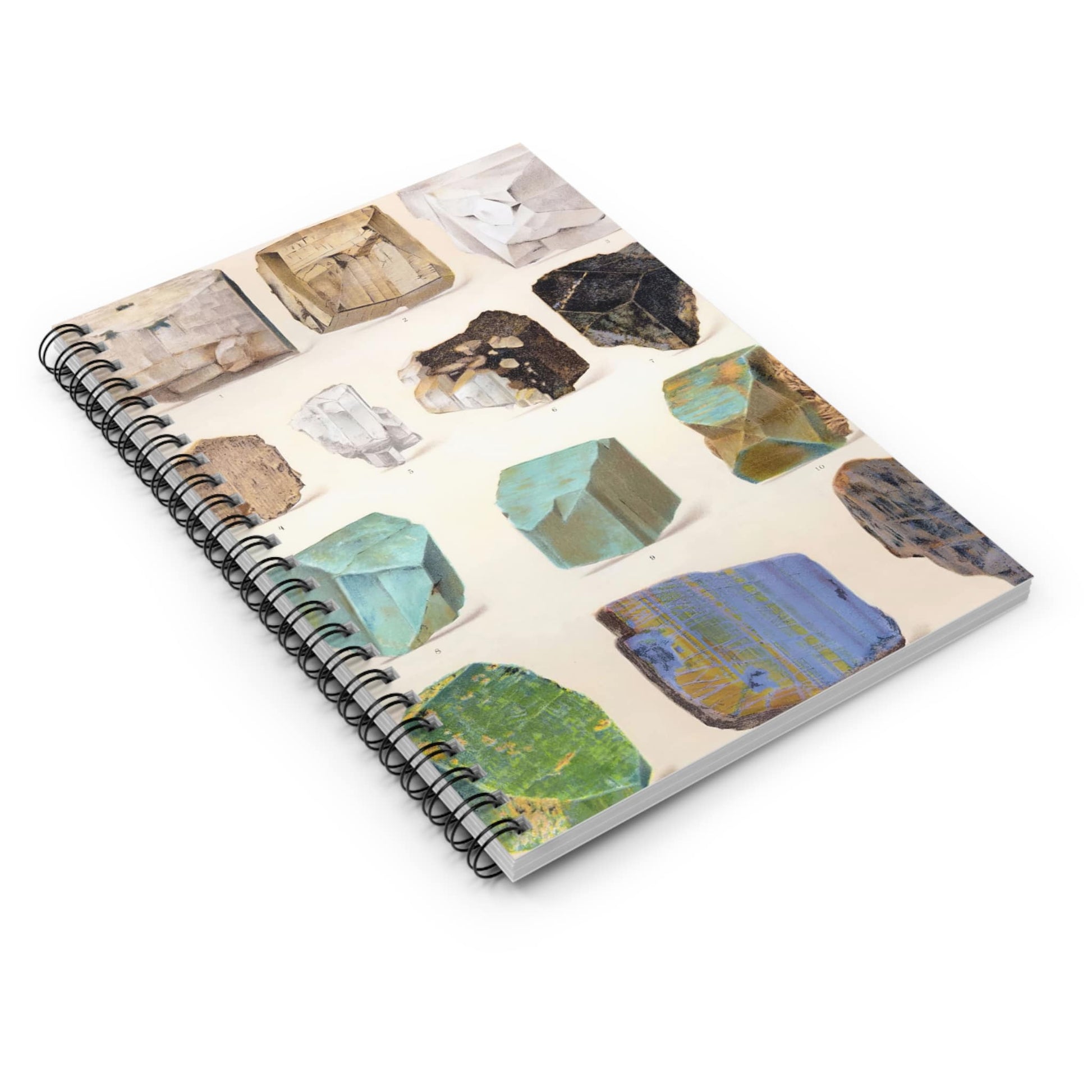 Raw Crystals and Gemstones Spiral Notebook Laying Flat on White Surface