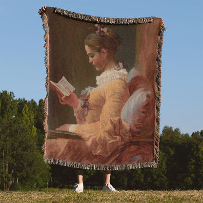 Reading Aesthetic Woven Blanket Held Up Outside
