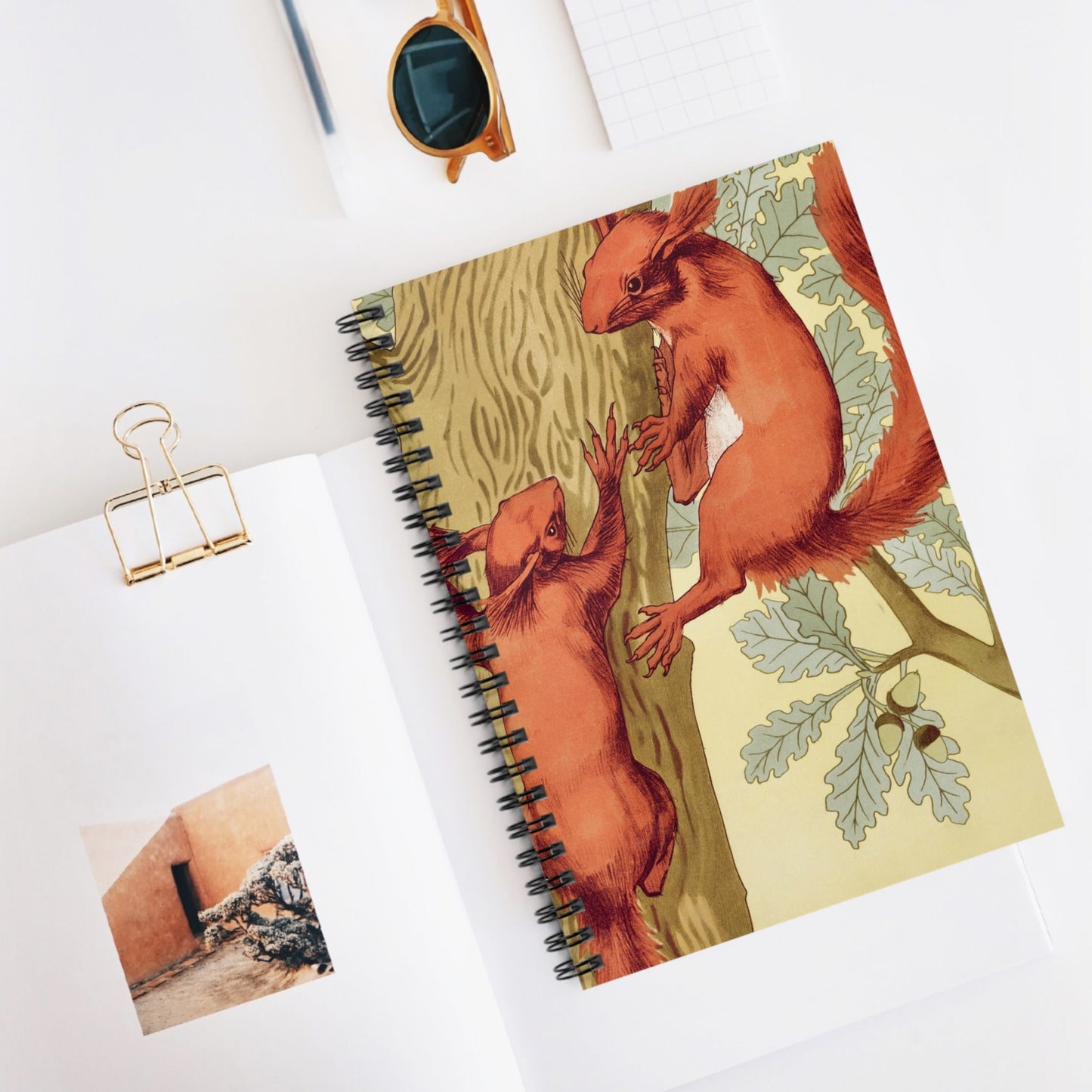 Red Squirrels Spiral Notebook Displayed on Desk