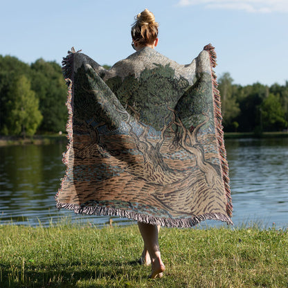 Relaxing Tree Woven Throw Blanket Held on a Woman's Back Outside