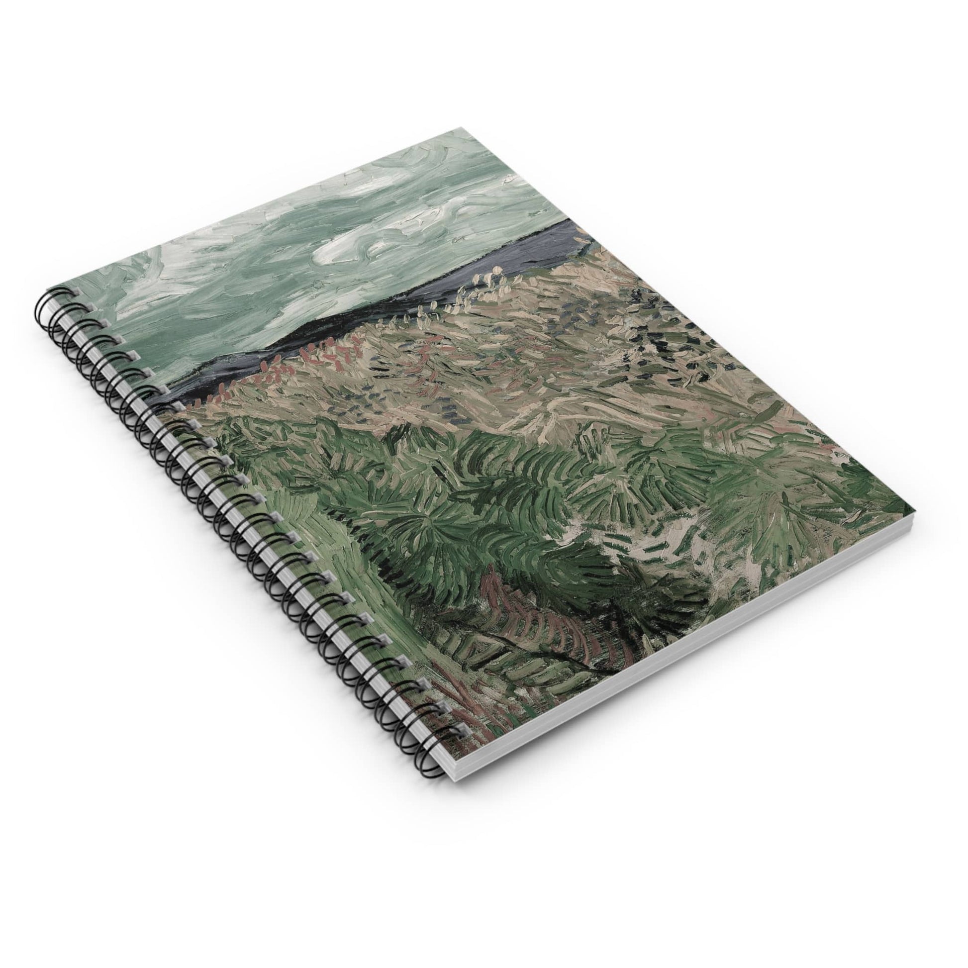 Revitalized Spiral Notebook Laying Flat on White Surface