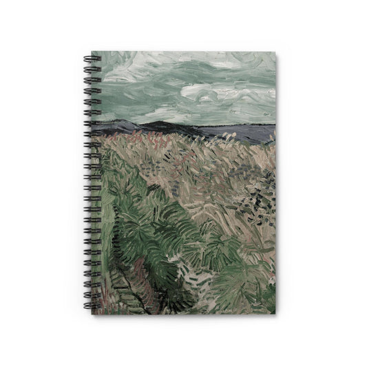 Revitalized Notebook with muted landscape cover, ideal for nature enthusiasts, featuring serene landscape illustrations.