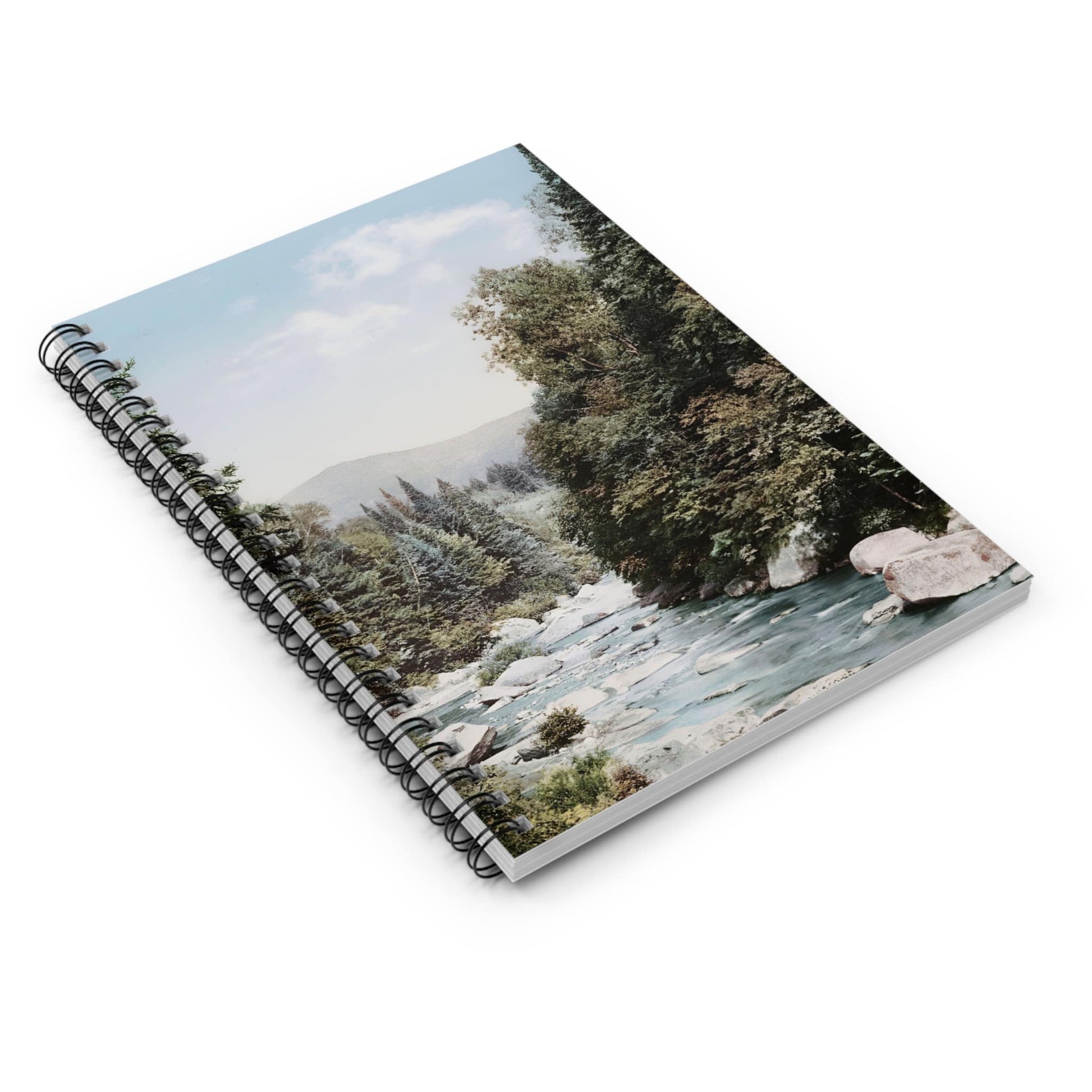 River Spiral Notebook Laying Flat on White Surface