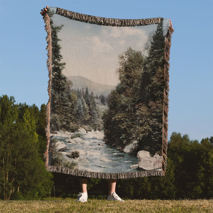 River Woven Blanket Held Up Outside