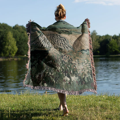 Rolling Hills Woven Blanket Held on a Woman's Back Outside