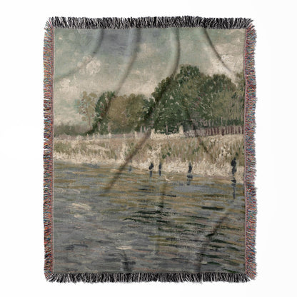Sage Green Paris woven throw blanket, crafted from 100% cotton, offering a soft and cozy texture with a Le Seine theme for home decor.