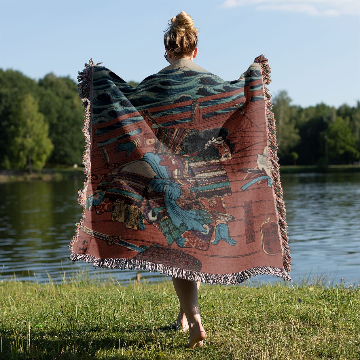 Warrior on a Boat Woven Blanket Held on a Woman's Back Outside