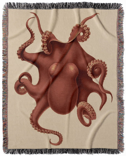 Sea Creature woven throw blanket, made of 100% cotton, featuring a soft and cozy texture with an orange-red octopus for home decor.