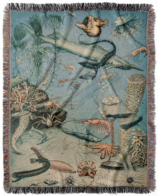 Sea Life woven throw blanket, crafted from 100% cotton, delivering a soft and cozy texture with shrimp and sharks designs for home decor.