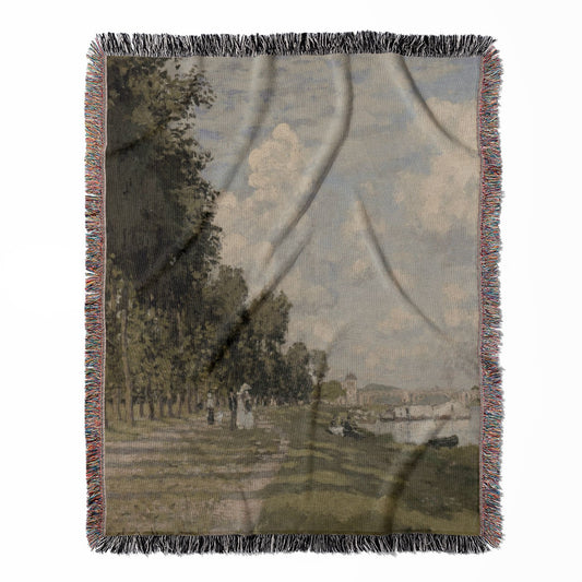 Seaside woven throw blanket, made of 100% cotton, featuring a soft and cozy texture with a Claude Monet theme for home decor.