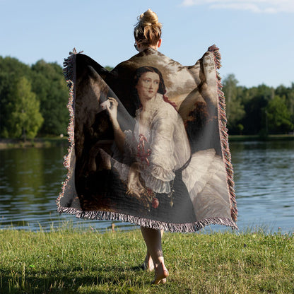 Secret Romance Woven Blanket Held on a Woman's Back Outside