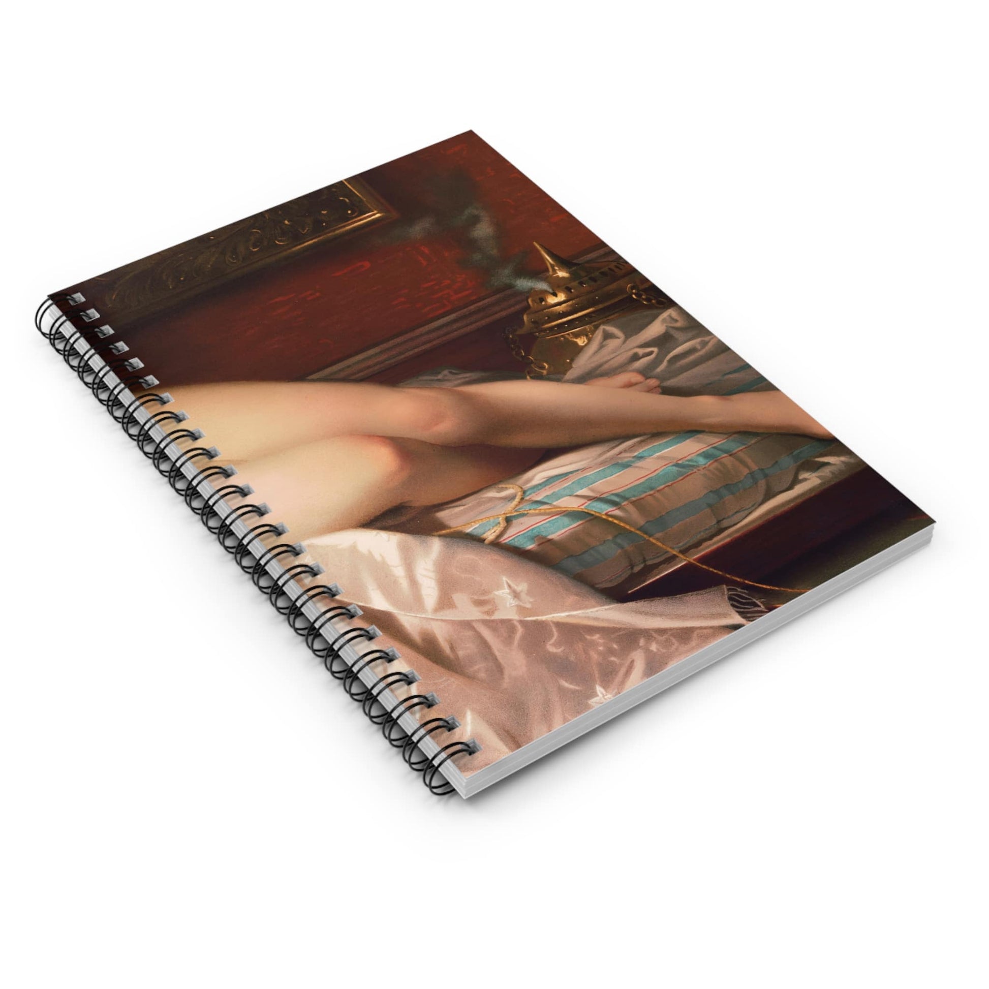 Sensual Female Spiral Notebook Laying Flat on White Surface