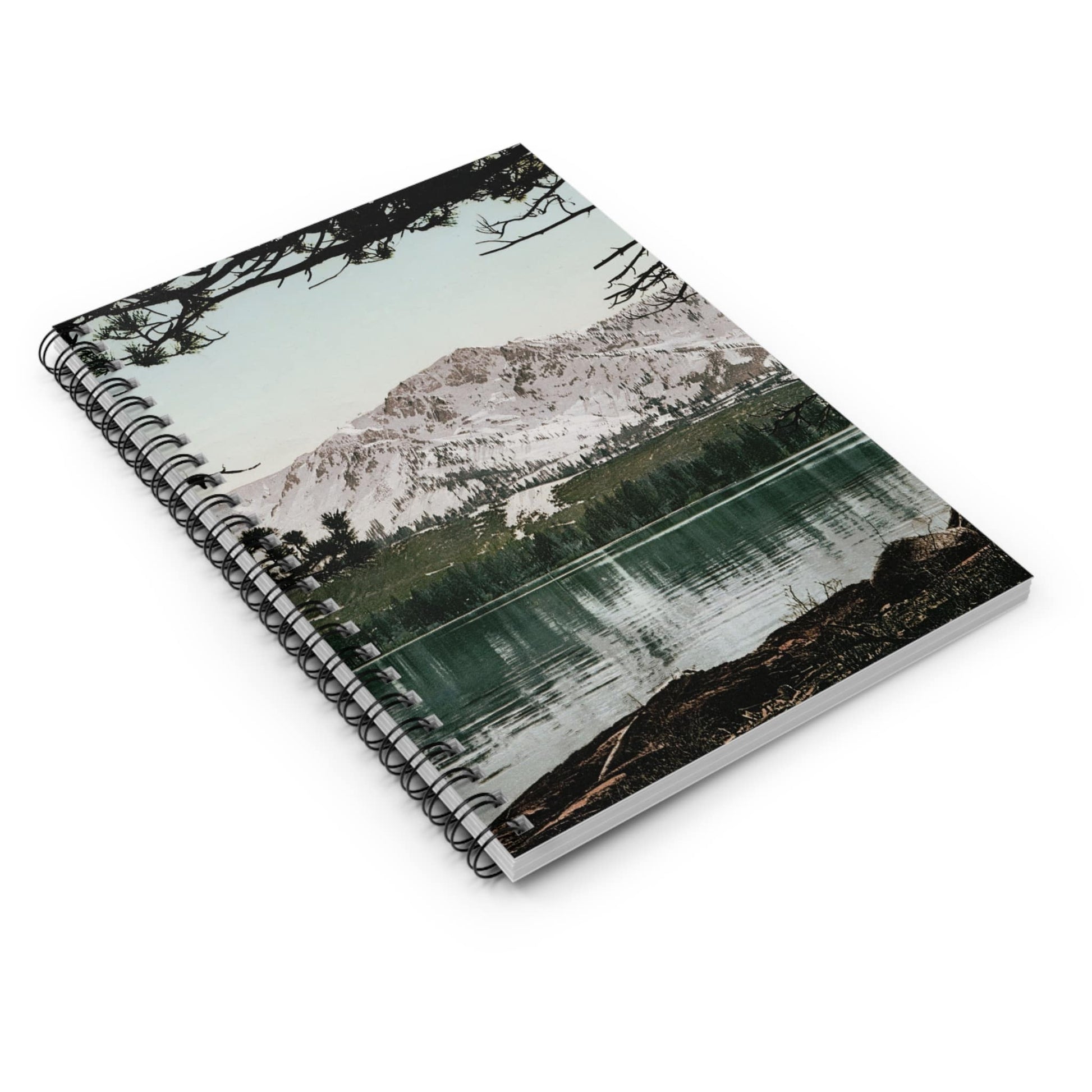 Snowy Mountains Spiral Notebook Laying Flat on White Surface